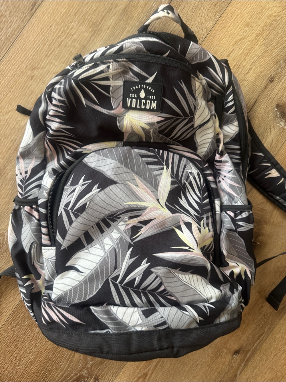 Volcom Black Backpack with Soft Neutral Tropical Print